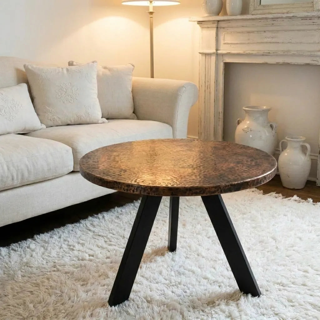 Rustic Round Copper Coffee Table with Artisan Hammered Surface and Warm Copper Tones