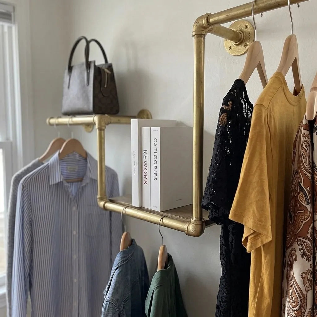 Luxury brass wall closet organizer with multiple hanging rails