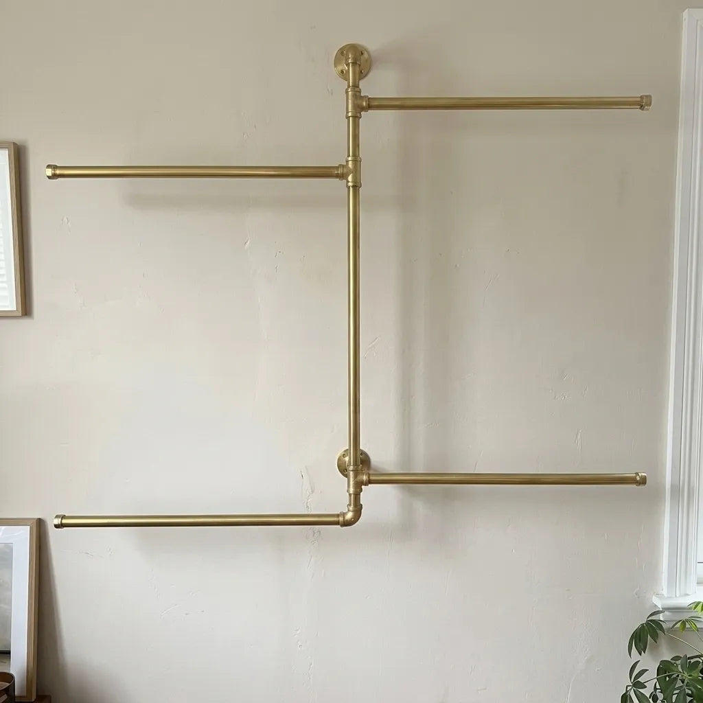 Contemporary brass wall organizer for scarves and garments