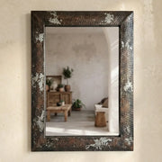 Rustic Hammered Metal Wall Mirror with Distressed Patina Frame and Industrial Design