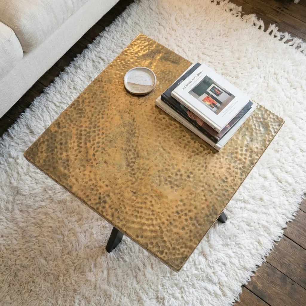 Seamless polished brass coffee table for modern living room
