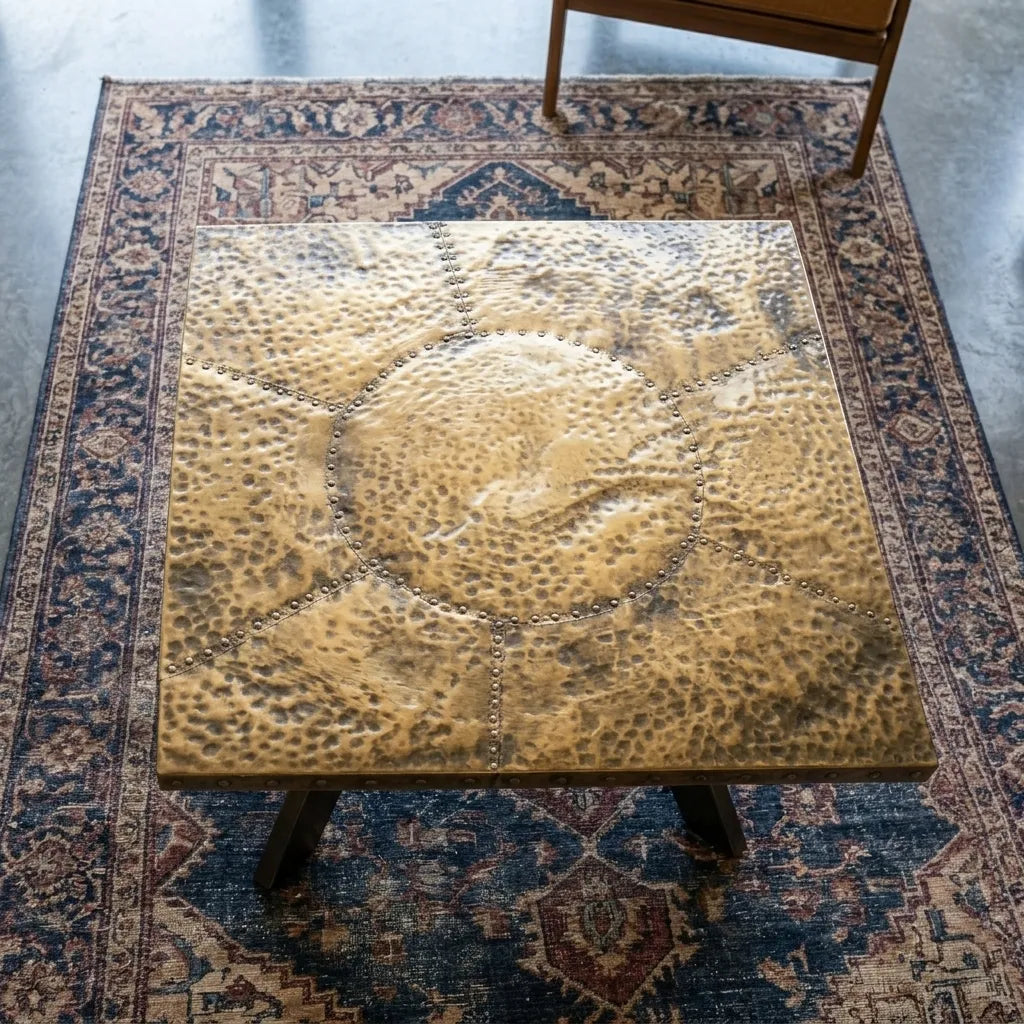 Handcrafted antique brass living room table with black metal legs