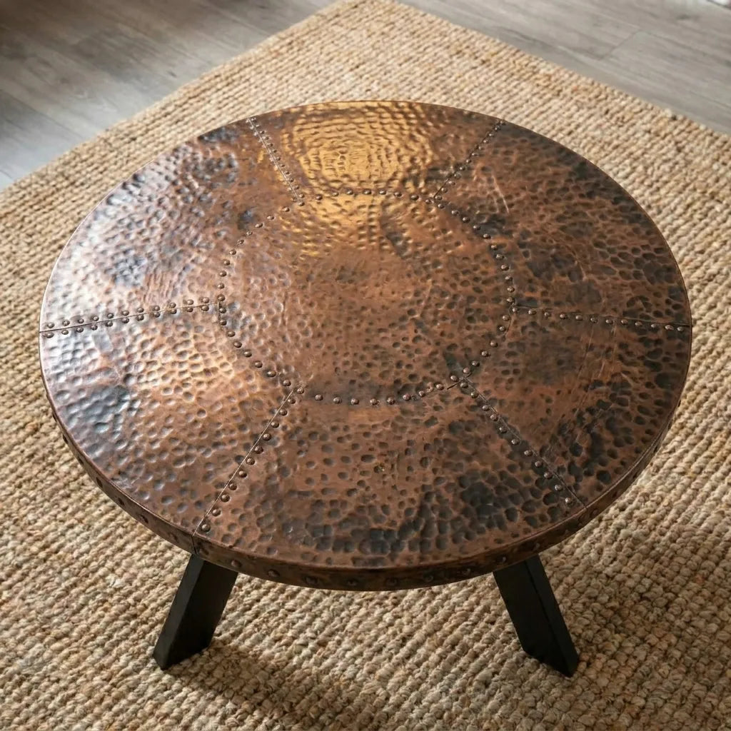 Round Hammered Copper Coffee Table with Riveted Pattern and Rustic Industrial Style