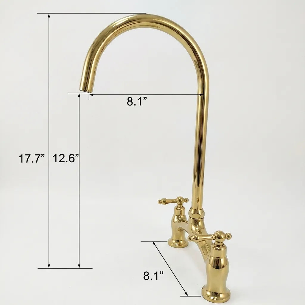 A polished brass kitchen faucet with two cross handles, shown with overlaid dimension lines and measurements for height and width on a plain light background.