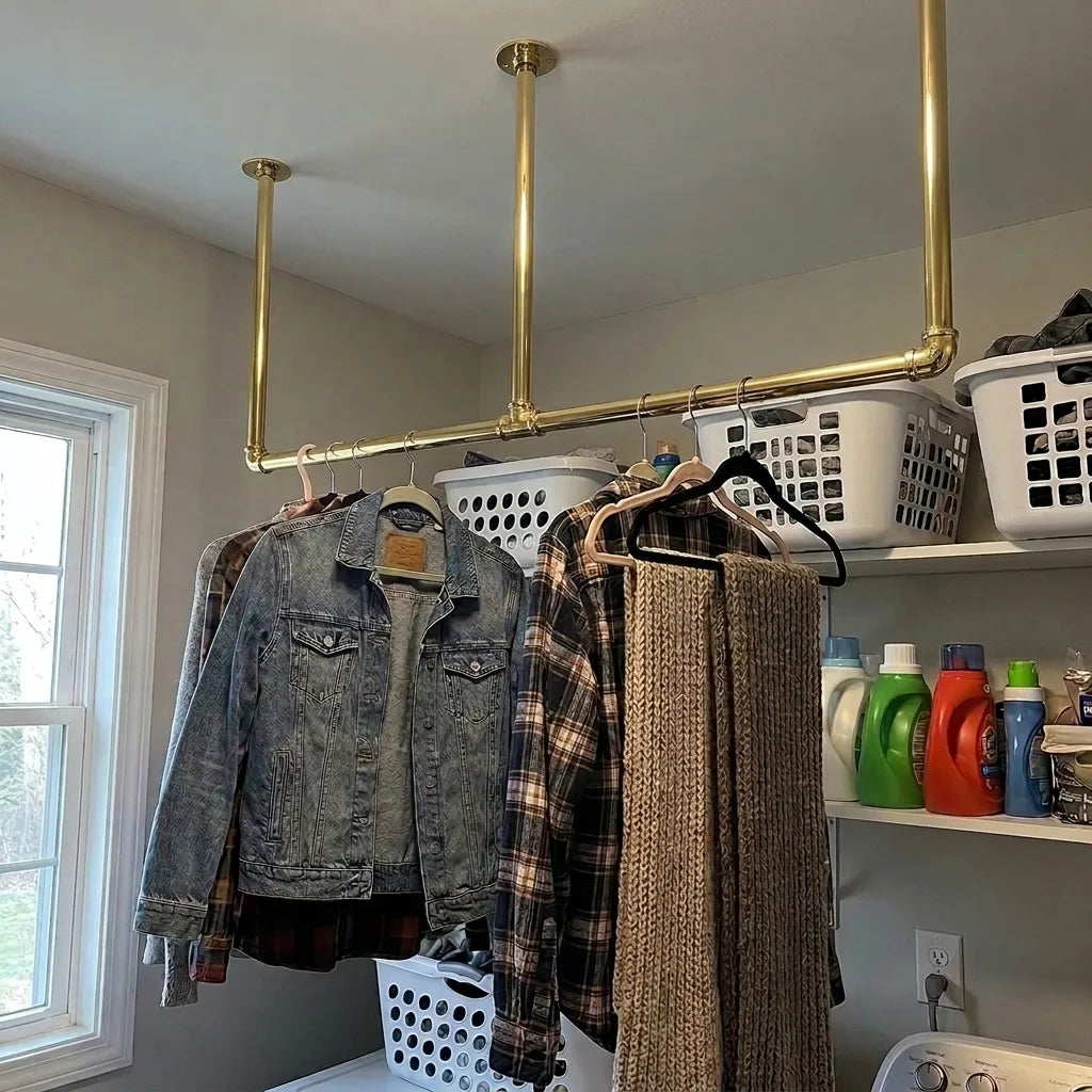 Ceiling mounted solid brass clothes rail in modern laundry room
