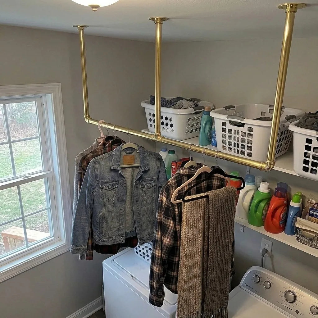 Handcrafted brass hanging rail suspended from ceiling