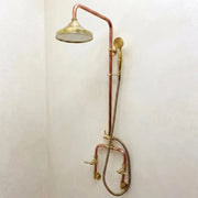 Wall mounted exposed copper shower with brass rain shower head, handheld sprayer and exposed plumbing