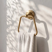 Geometric Brass Hand Towel Holder with Rounded Trapezoid Design