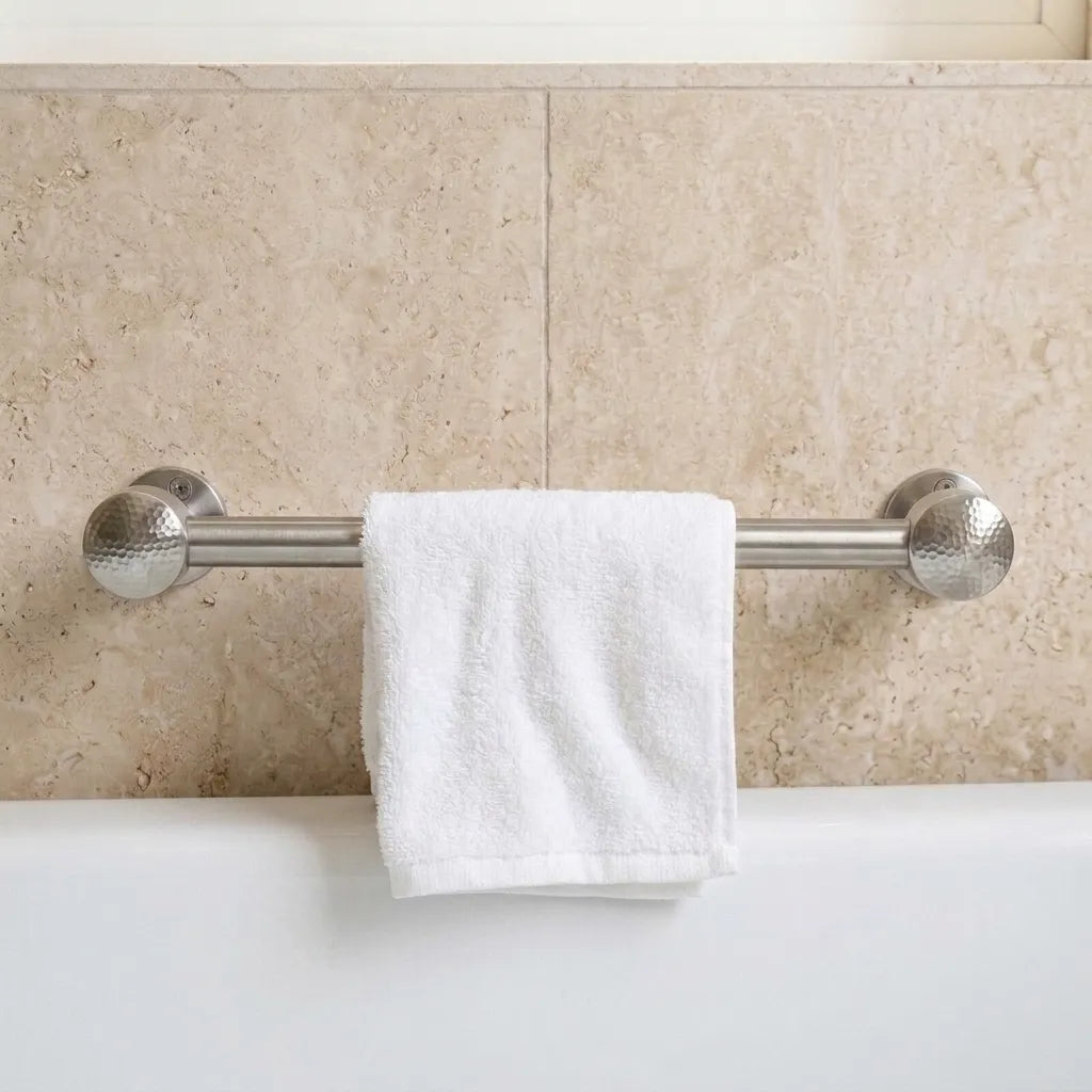 Decorative chrome bathroom rail with textured round finials
