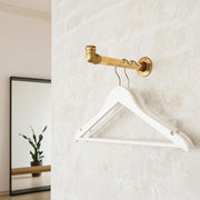 Solid brass wall mounted clothes hanging rail for entryway and mudroom