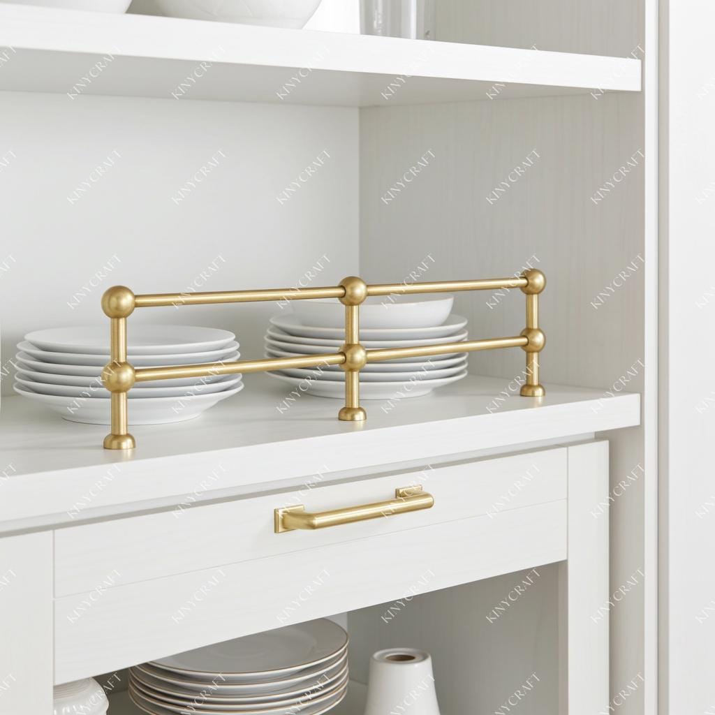 Handcrafted double-tier brass cabinet gallery rail with decorative ball finials for elegant kitchen shelf organization.