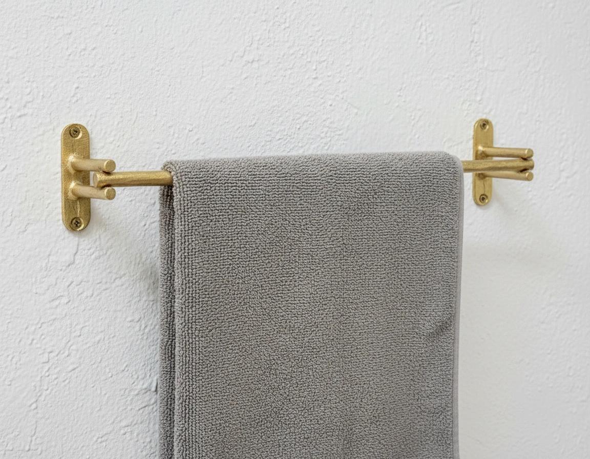 Solid brass wall mounted towel bar with minimalist double rod design