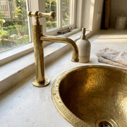 Luxury solid brass bathroom faucet for modern, farmhouse, and classic interiors.