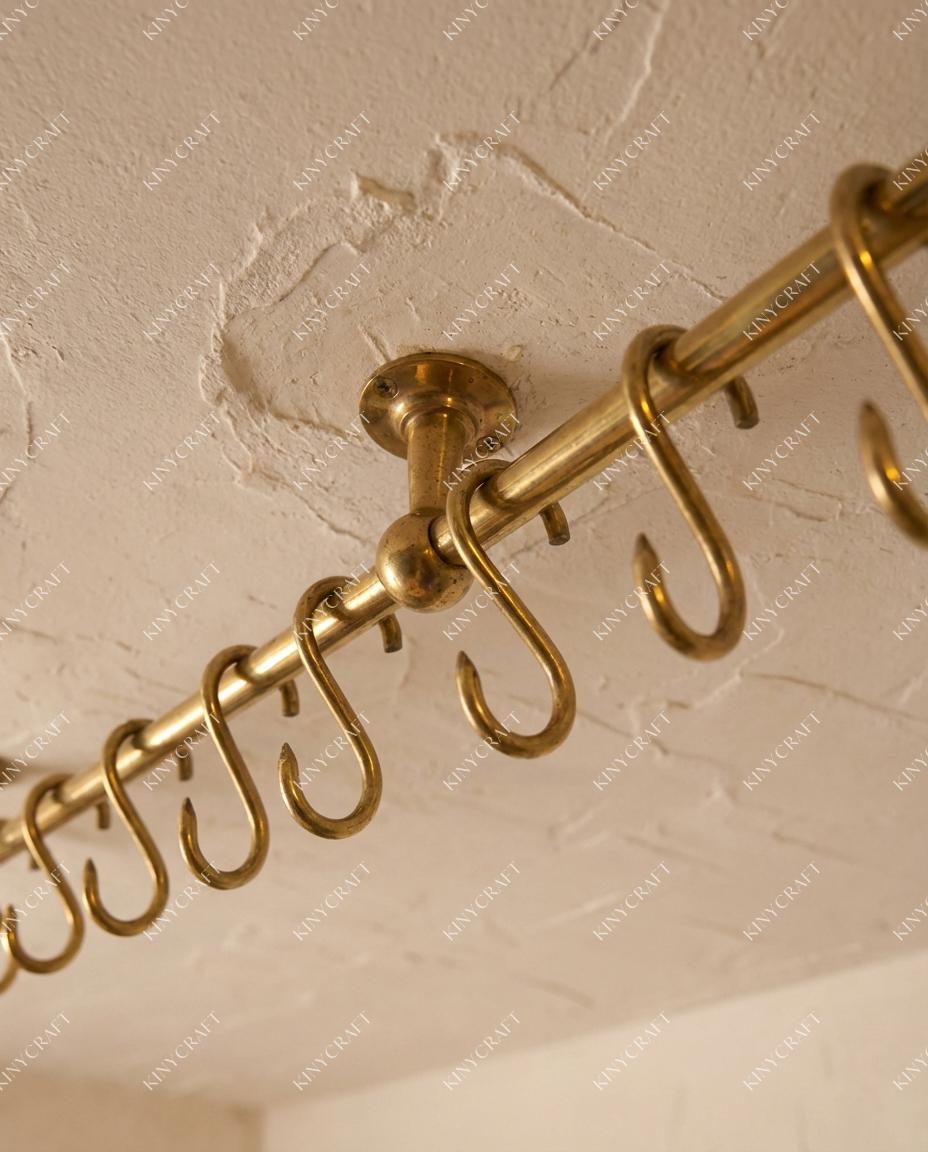 Handmade brass wall mounted pot rail with removable hooks for kitchen utensils