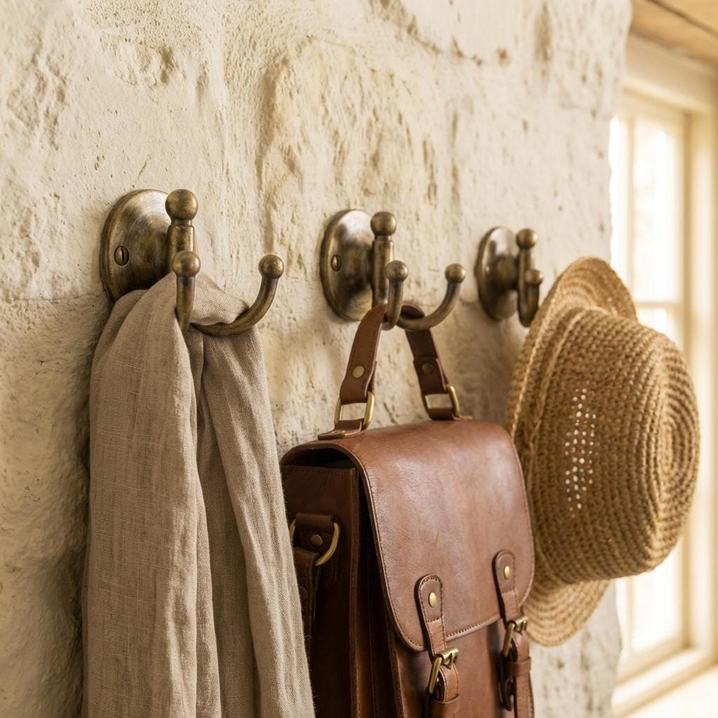 Vintage brass double utility hook for bathroom, hallway, mudroom, or closet storage.