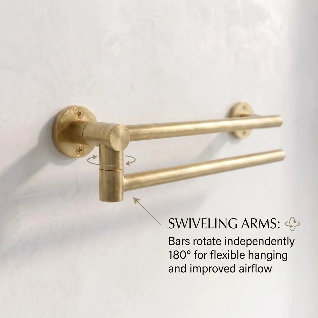 Close-up of a handcrafted solid brass swivel towel rack featuring dual 180° rotating arms for space-saving towel storage and faster drying.